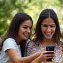 Travelers checking route map on mobile phone