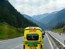 ÖAMTC roadside assistance van helping driver on motorway shoulder